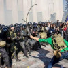 Задержан сын кандидата в нардепы от «Свободы» Захарчука, избивавший цепью правоохранителей под Радой (ФОТО)