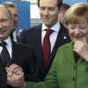 Путину все же удалось добиться встречи с Меркель