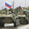 В Торезе стрельба, а через Макеевку движется колонна танков с флагом РФ (ВИДЕО)
