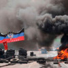 Боевики сожгли 2 КамАЗа трупов после боев в Марьинке, — источник