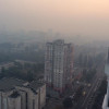 Этот едкий дым. Киевляне массово публикуют фото столицы, накрытой смогом